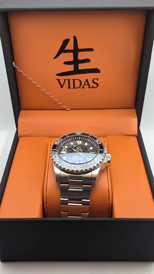 Custom-designed VIDAS watch with stainless steel bracelet and luminous hands